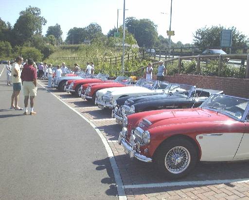 A dozen Healeys line up for the start of the run in Tesco's car park at Congleton.
