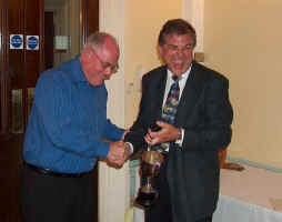 Tim V accepts Ivor Davies's best overall award. Sunday.
