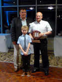 Tony and Henry present Martin Booth with the Best shield