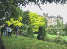 Admiring the spectacular gardens and hall.