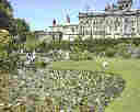 Biddullph Grange with the lake in the foreground.