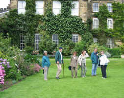 Posing members outside the hall.